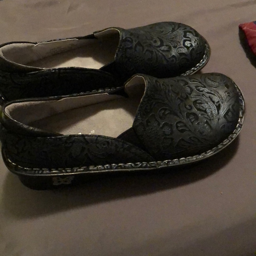 Blue and black clogs